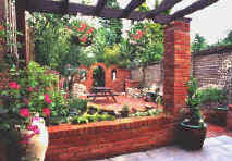 This garden design featured substantial brick work features, a timber pergola and yet plenty of planting within the garden design