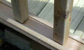 Bottom rail of deck balustrade